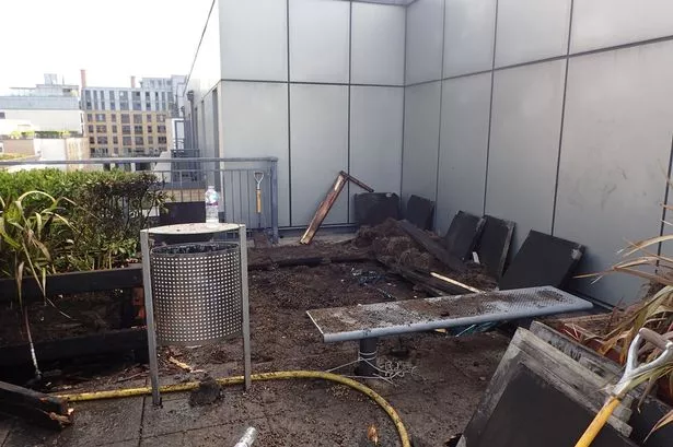 Photo shows Fulham roof garden destroyed by fire
